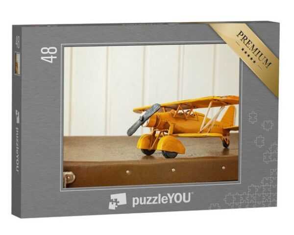 puzzleYOU Puzzle Gelbes Spiel-Flugzeug auf einem Retro-Koffer, 48 Puzzleteile, puzzleYOU-Kollektionen Nostalgie